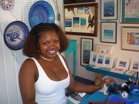 Rhythm of Blue Art Gallery,Antigua Arts;copper sculptures and handmade silver jewelry incorporating natural pearls, carved fossils and selected gem stones.